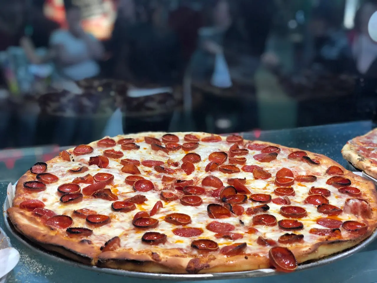 Photo of a whole pepperoni pizza