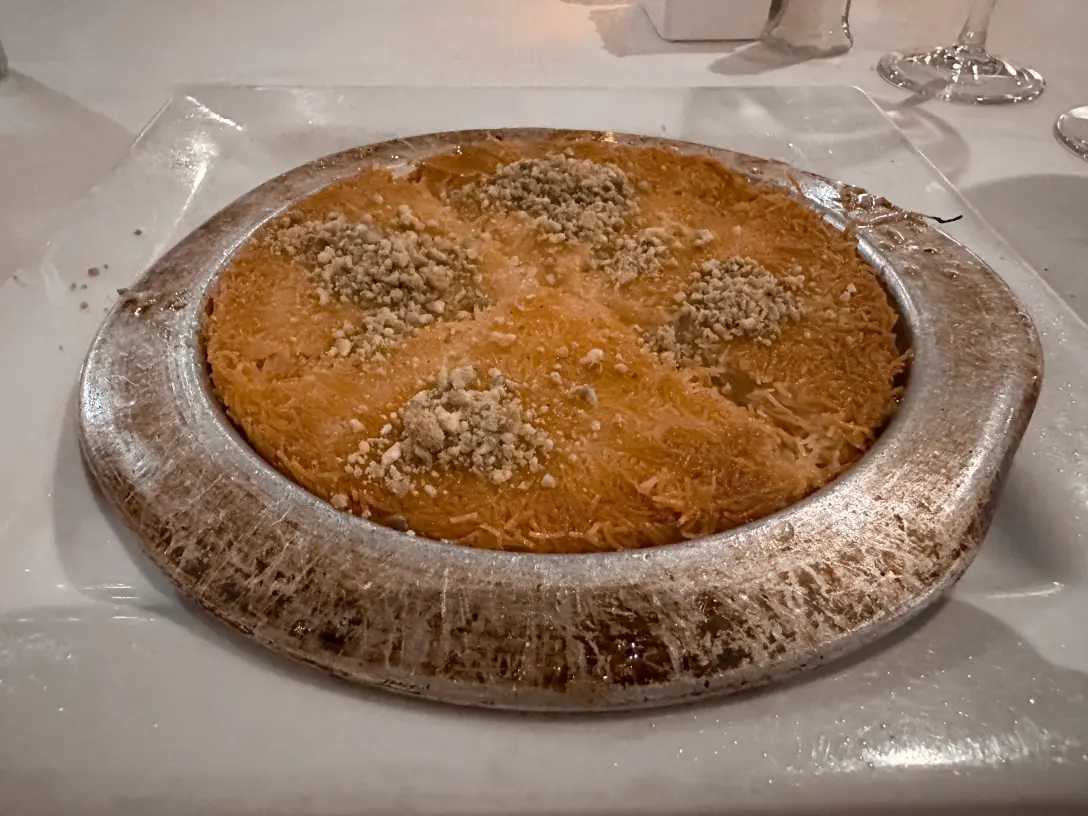 Photo of kunefe in a metal dish