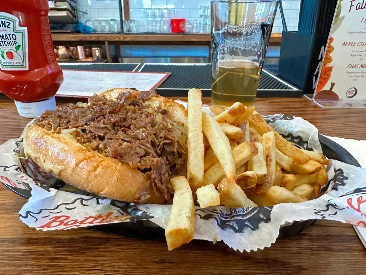 Photo of a philly steak and fries