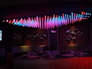 Photo of neon and balloons