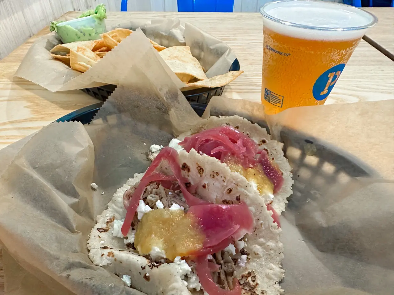 Photo of tacos and a beer