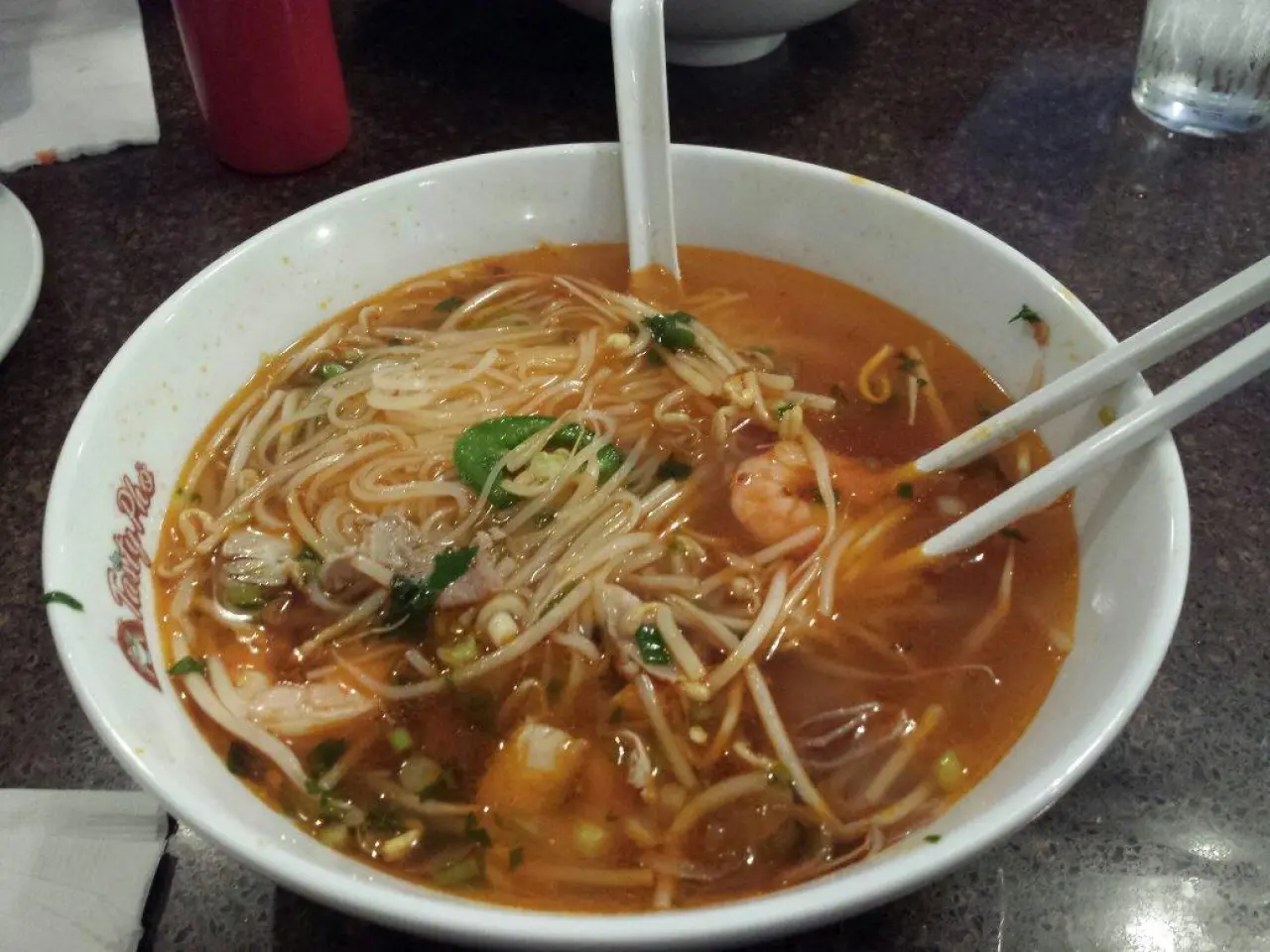 Photo of a bowl of seafood pho