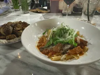 Photo of boar and rabiit caciatore and brussels sprouts