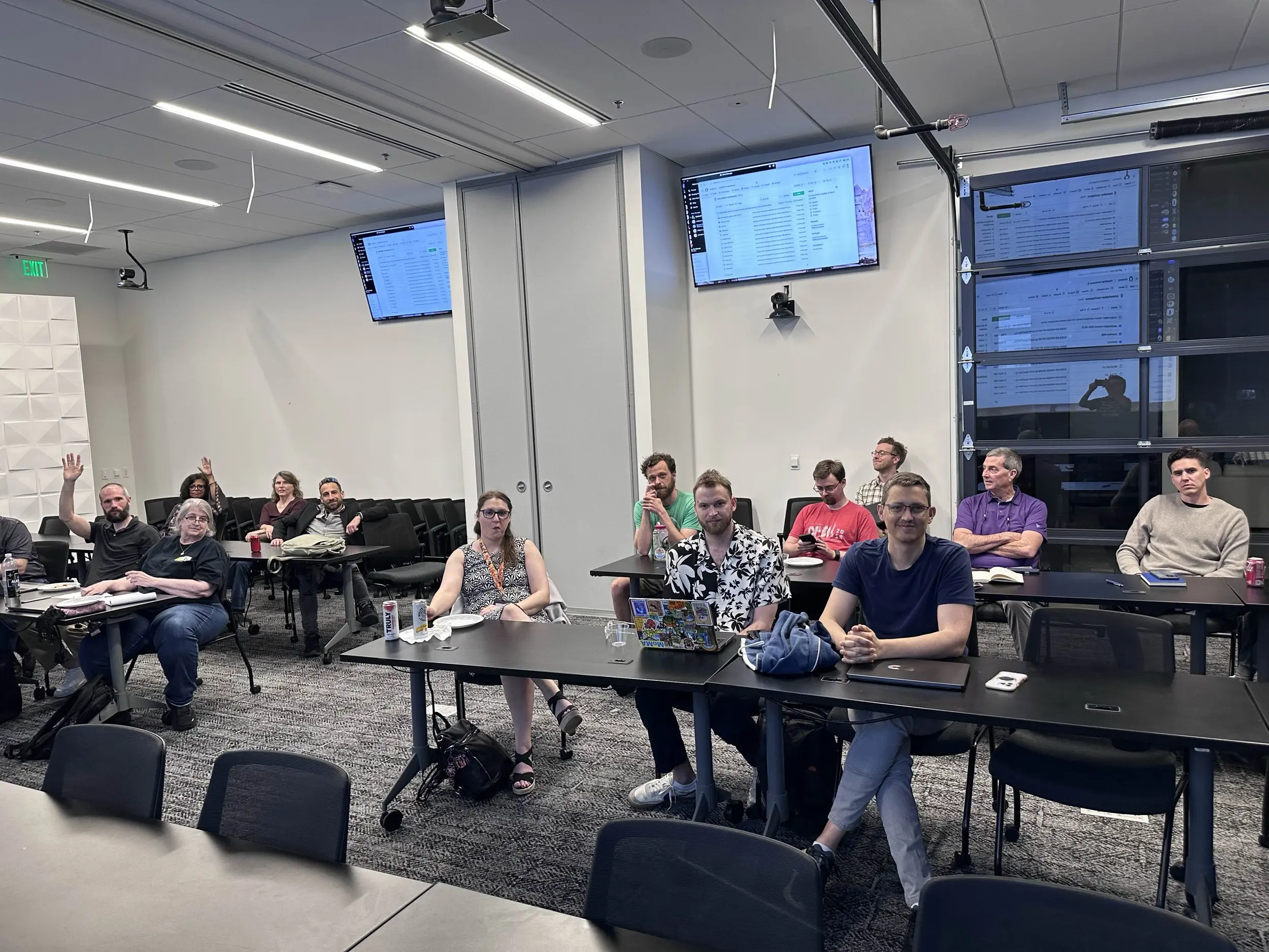 Audience seated at tables during an AI meetup at Vaco in the Nashville area
